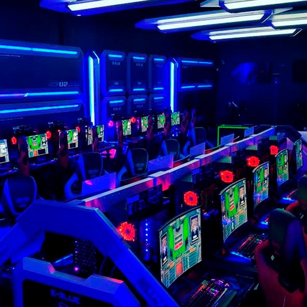 Pure Esports Gaming Room with UV Lights On